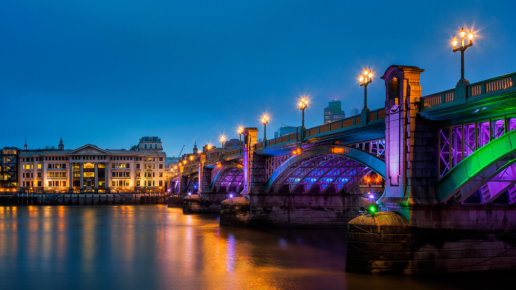 colorful light on southwark bridge in london