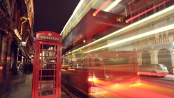 double decker bus in long exposure on london street