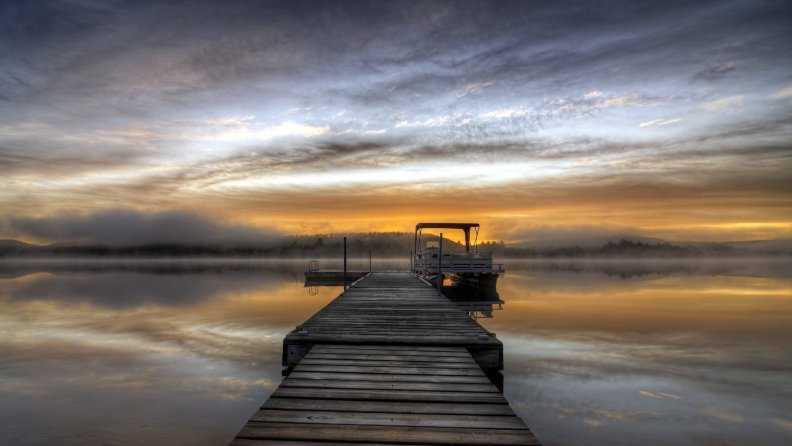boat docks on a lake in morning