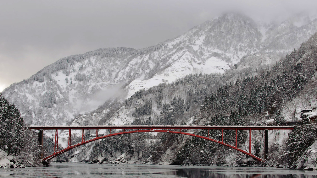 beautiful red bridge in winter