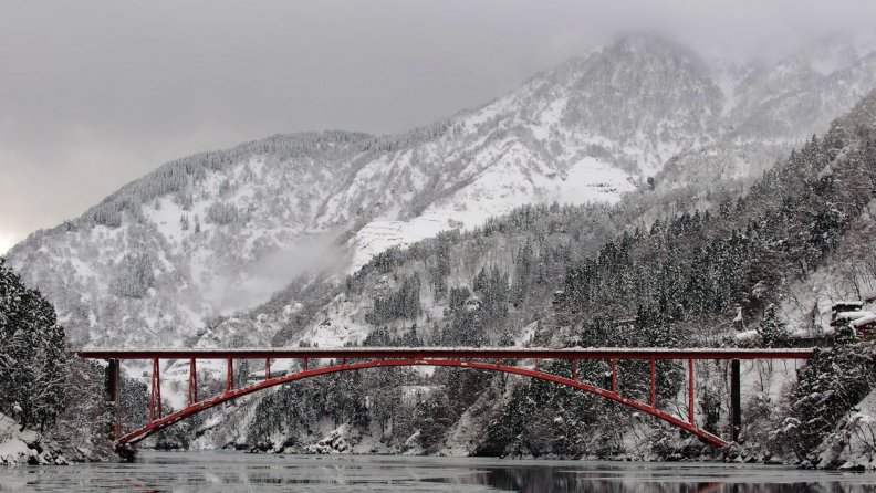 beautiful red bridge in winter