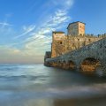ancient castle off seashore