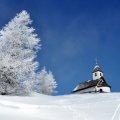 beautiful church on a hill in winter