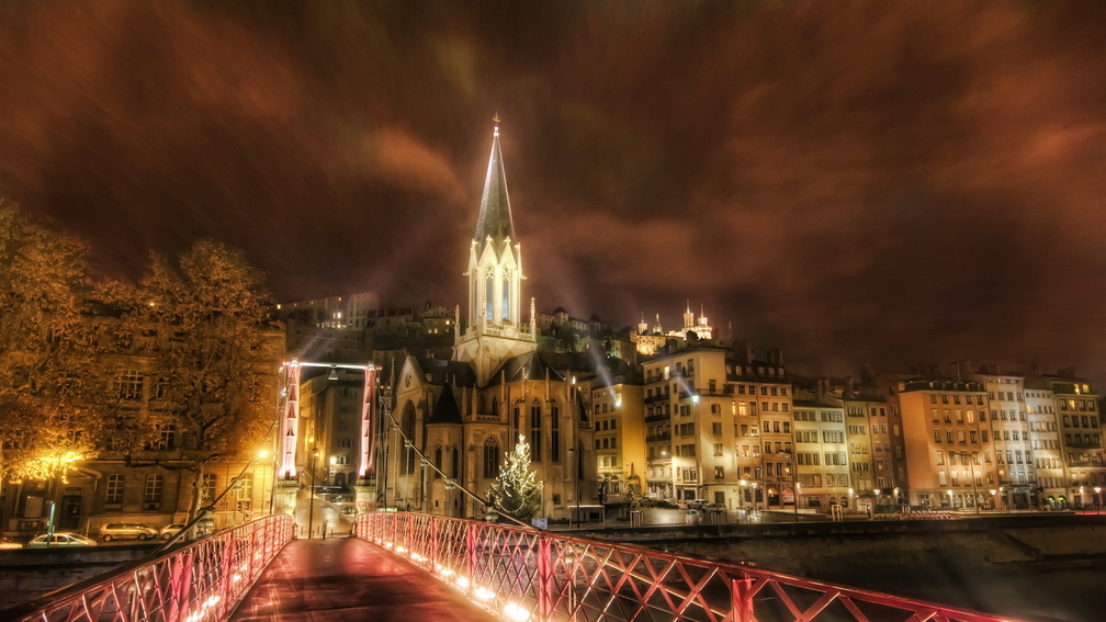 rays of light over a bridge in lyon france hdr