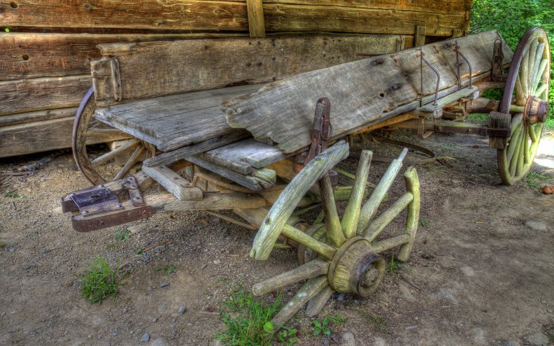 old_wooden_horse_wagon_with_a_flat_tire_hdr.jpg
