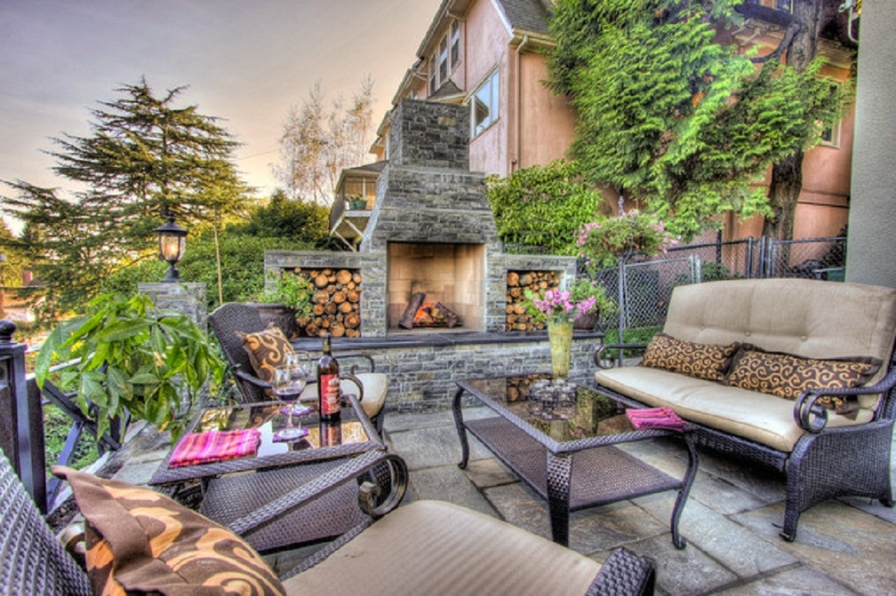 traditional patio with fireplace