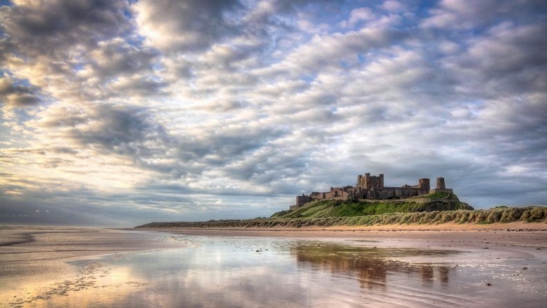 magnificent_old_castle_on_a_hill_above_a_beach_hdr.jpg