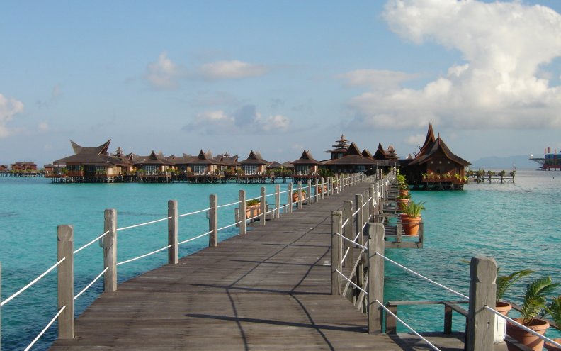 a_pier_to_a_bungalow_resort_in_paradise.jpg