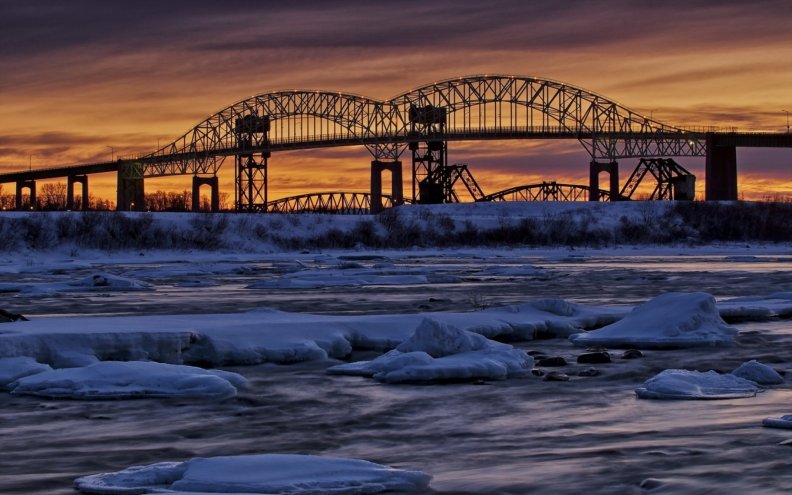 dual_bridges_over_a_river_in_winter.jpg
