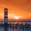 lighthouse on lake neusiedl austia at sunset