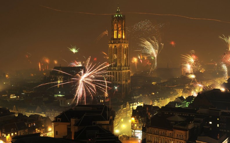 fireworks around a city cathedral
