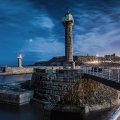fantastic lighthouses infront of a town on a cliff hdr