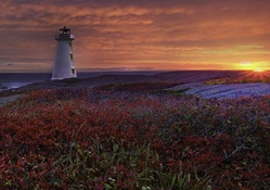 awesome lighthouse at sunset landscape