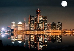 city ​​and moon at night