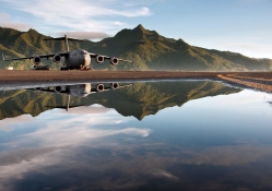 c_17 globemaster reflected in a pool