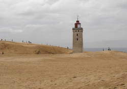lighthouse on a beach in denmark