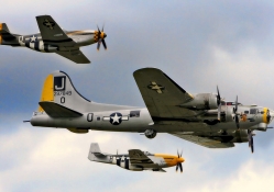 WWII B17 Bomber Escorted by P51 Fighters