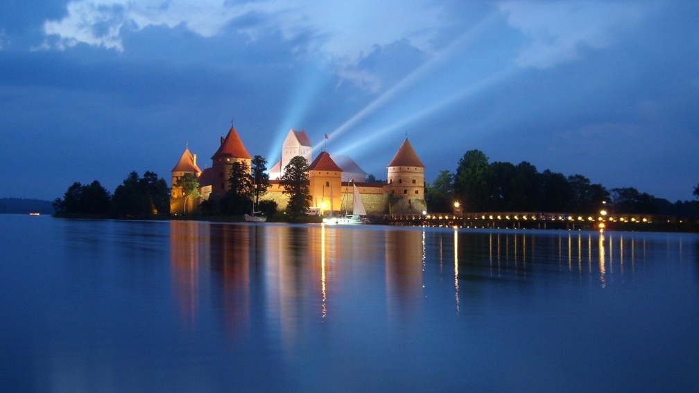 lights from trakai castle in lithuania