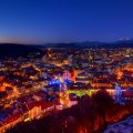 gorgeous mountain city at night in slovenia