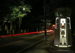 public phone on a yokohama street at night