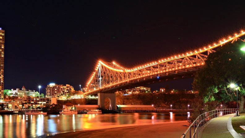 river_walk_under_a_bridge_at_night.jpg