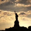 silhouette of lady liberty