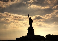 silhouette of lady liberty