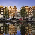 reflections in a canal in amsterdam