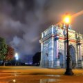 beautiful arch in a paris park after rain