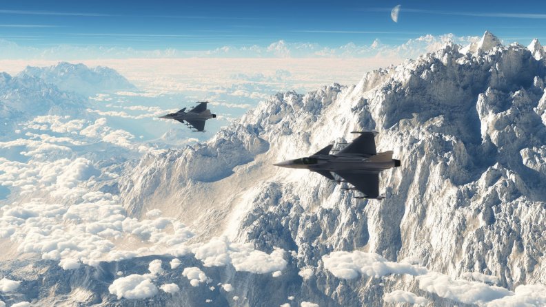 typhoon_fighter_jets_over_a_majestic_mountain_range.jpg