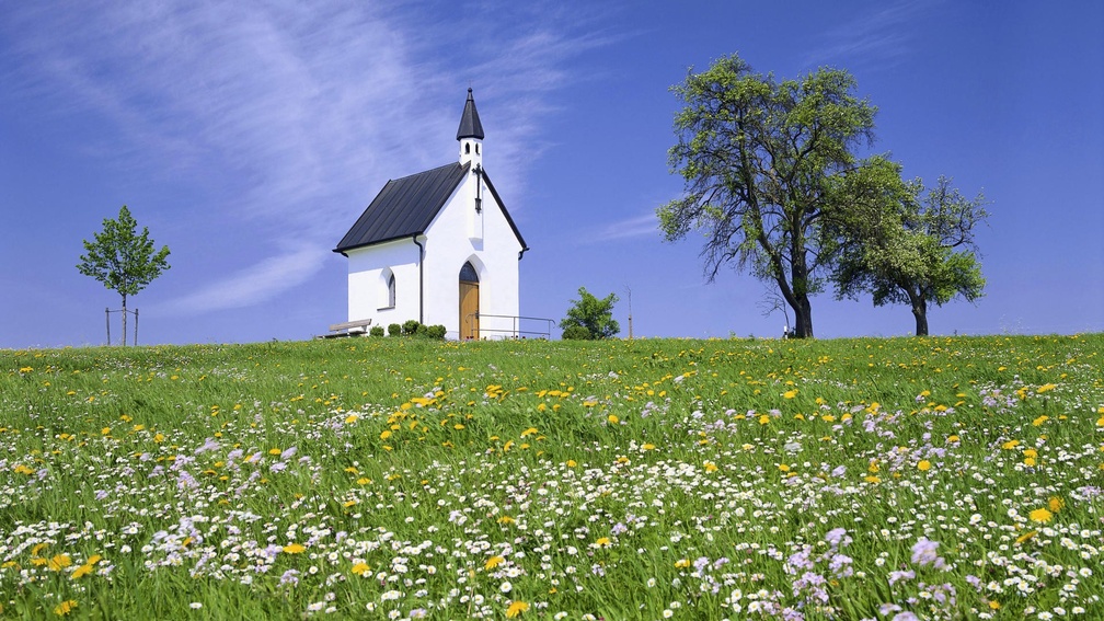 tiny bavarian chapel on a hill