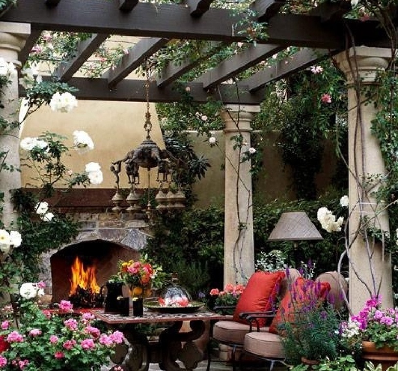 Terrace with fireplace and pergola