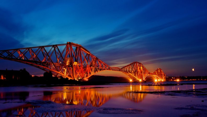 the_firth_of_forth_bridge_in_scotland_at_night.jpg