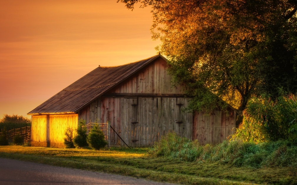 sunset on a barn hdr