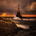 Lighthouse at Stormy Sea