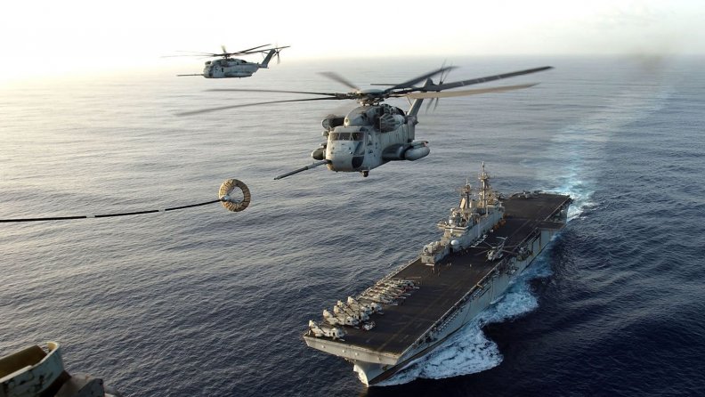 war ship and helicopter