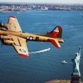 B17 flying fortress over the statue of liberty