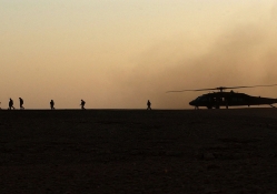 Helicopter and troops