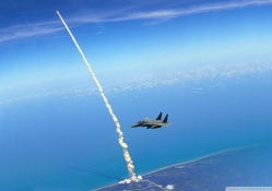 f14 over shuttle atlantis liftoff
