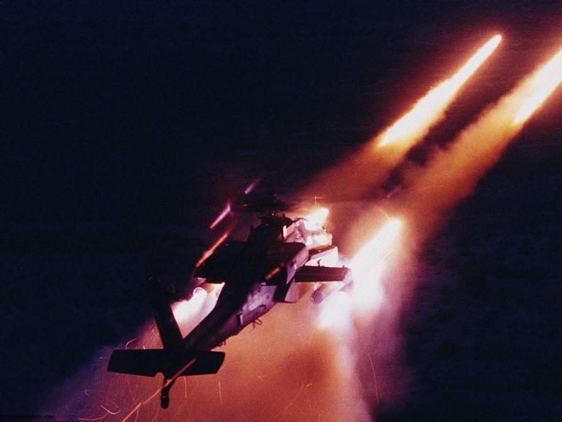 helicopter_lighting_up_the_sky_with_missles.jpg