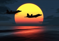 F_22 Raptors over sunset