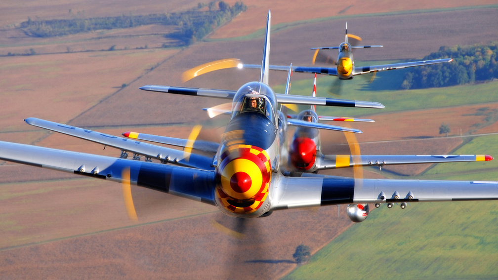 P_51 Mustangs over the English countryside 
