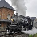 wonderful steam locomotive leaving a station