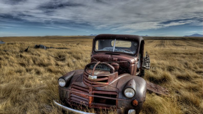 rusted gmc pickup on the prairie hdr