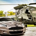 an aston martin dbs next to a helicopter hdr