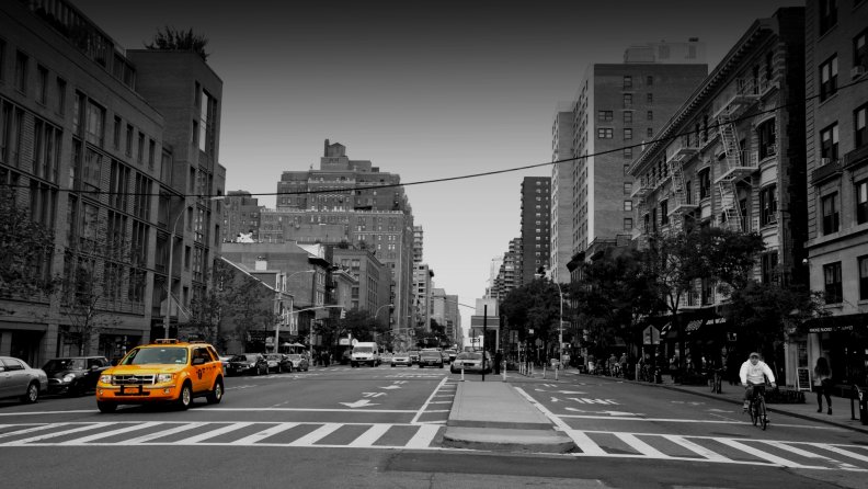 yellow_nyc_taxi_going_down_9th_avenue.jpg