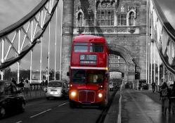 vintage double decker bus in london on tower bridge
