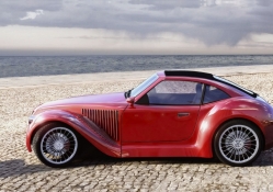 old red car in the beach