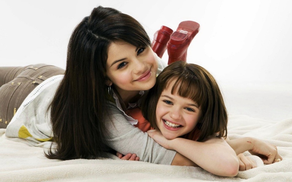 Selena Gomez with a cute kid.