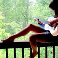 Cowgirl Playing Guitar